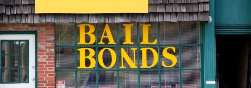 A bail bond agent's window signage.