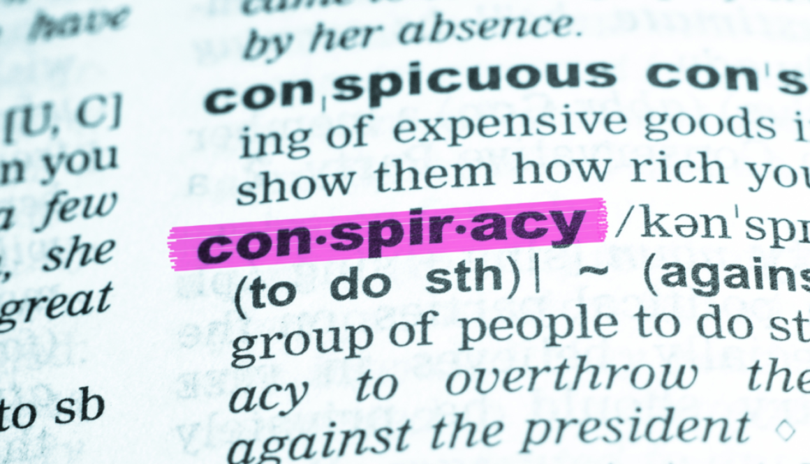 A page from a dictionary with the word conspiracy highlighted.
