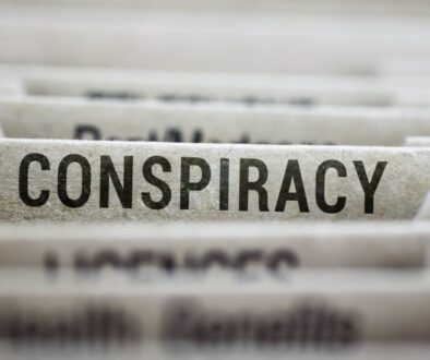 A conspiracy charge is when the court charges two or more people with the act of plotting a crime.