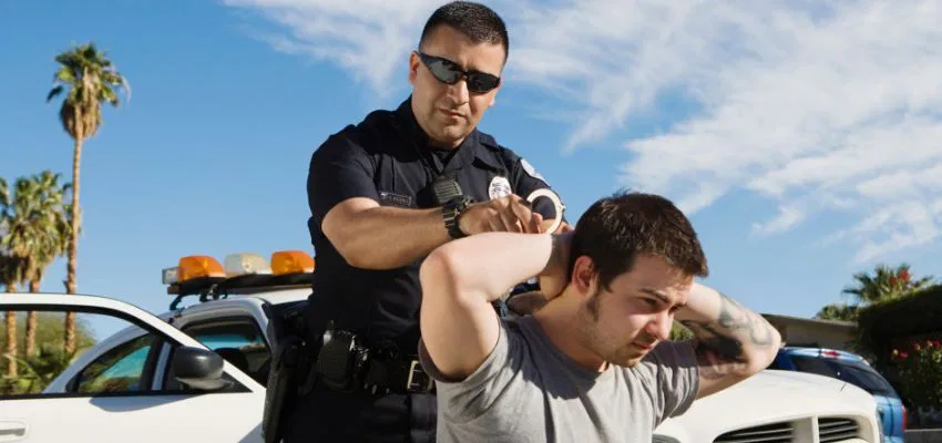 A man being arrested.